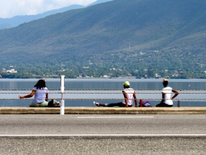 Admiring the view: Volunteers take a break on the Kingston Harbour side. (My photo)